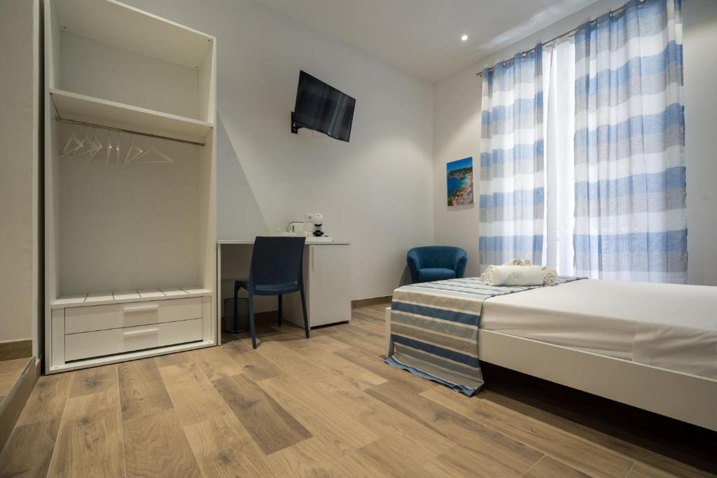 Postel nebo postele na pokoji v ubytování All'Imbarco