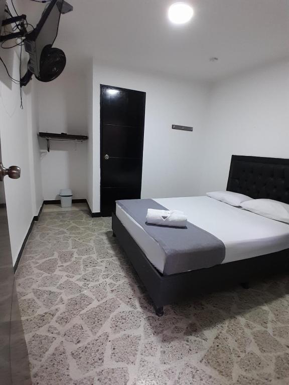 Postel nebo postele na pokoji v ubytování Hotel Palermo Real