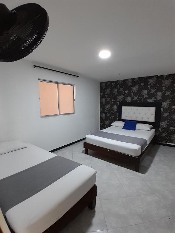 Postel nebo postele na pokoji v ubytování Hotel Palermo Real