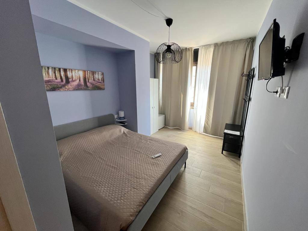 Postel nebo postele na pokoji v ubytování Affittacamere L'Aurora