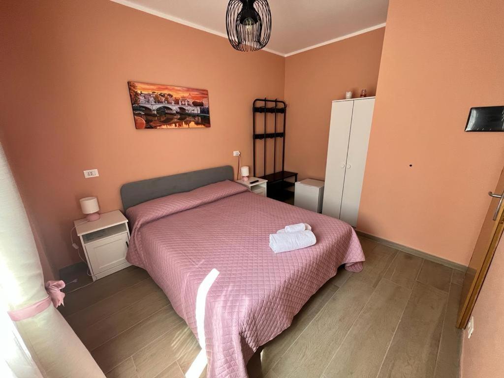 Postel nebo postele na pokoji v ubytování Affittacamere L'Aurora