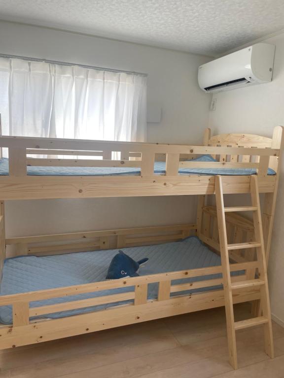 Postel nebo postele na pokoji v ubytování 広々とした新築戸建 八街駅から徒歩10分車3台駐車可4LDK Free wifi