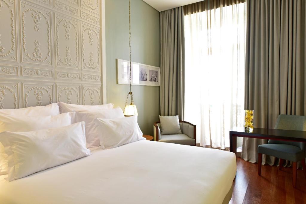 Postel nebo postele na pokoji v ubytování Pousada de Lisboa - Small Luxury Hotels Of The World