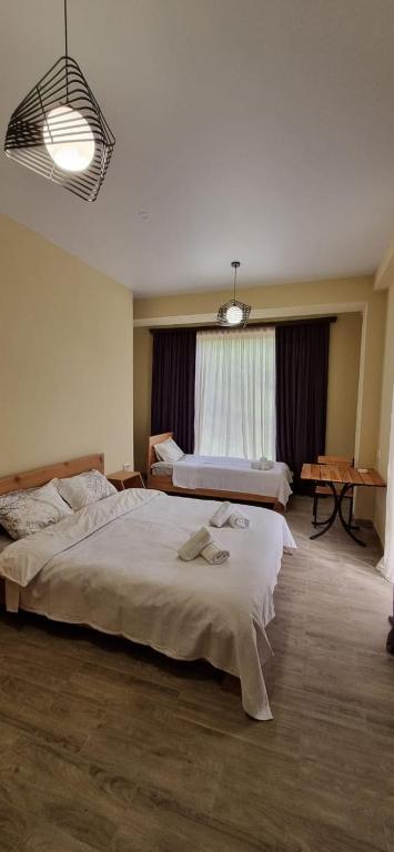 Postel nebo postele na pokoji v ubytování Hotel Canionel
