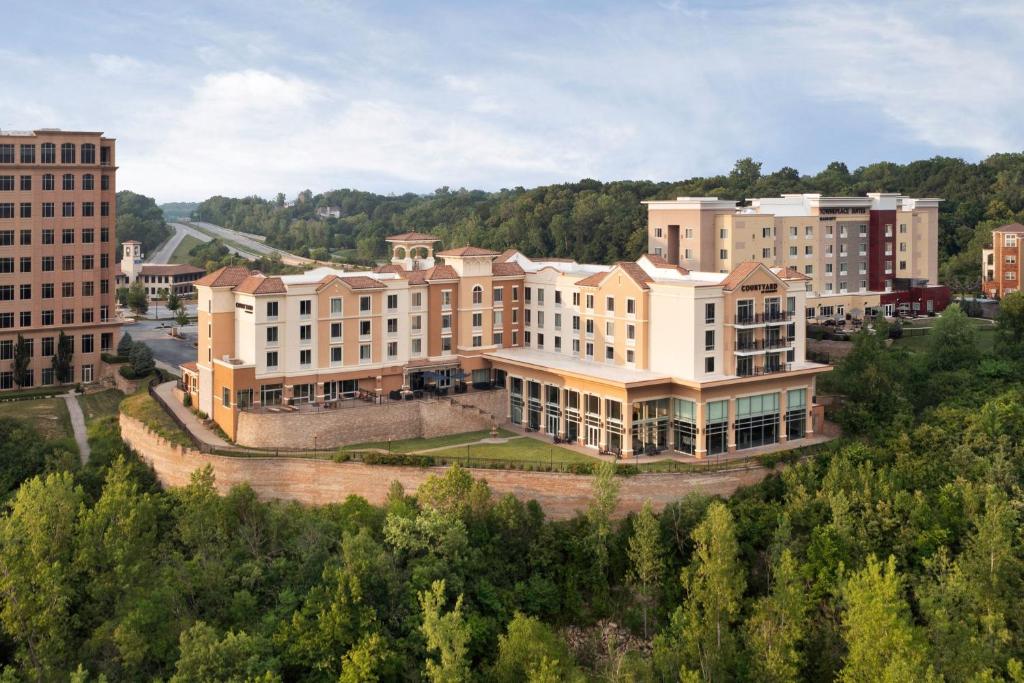 an aerial view of a city with buildings at Courtyard Kansas City at Briarcliff in Kansas City