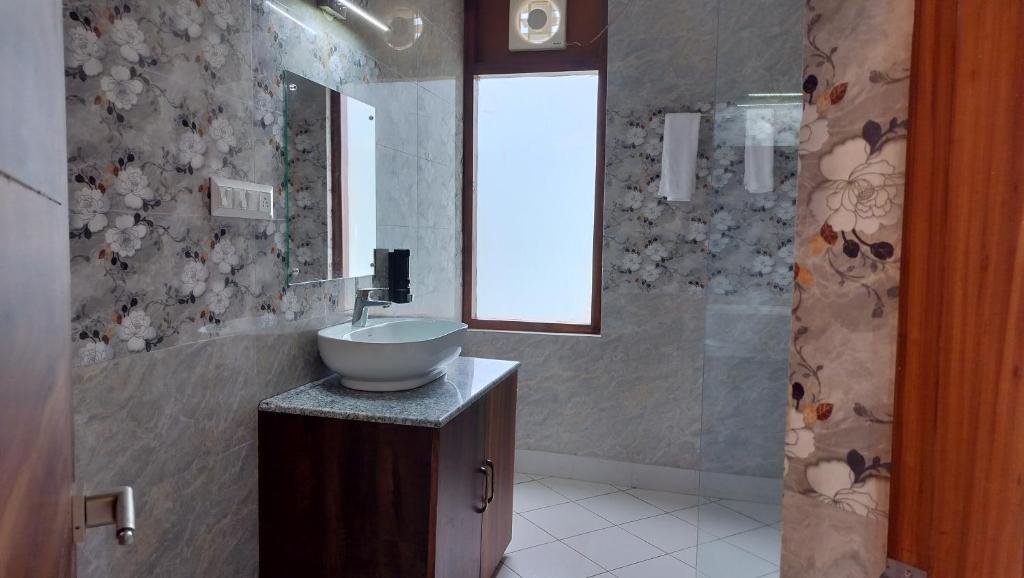 Koupelna v ubytování Appas Hotel