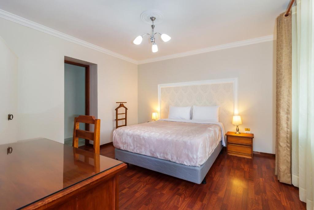 Postel nebo postele na pokoji v ubytování Hotel La Cartuja