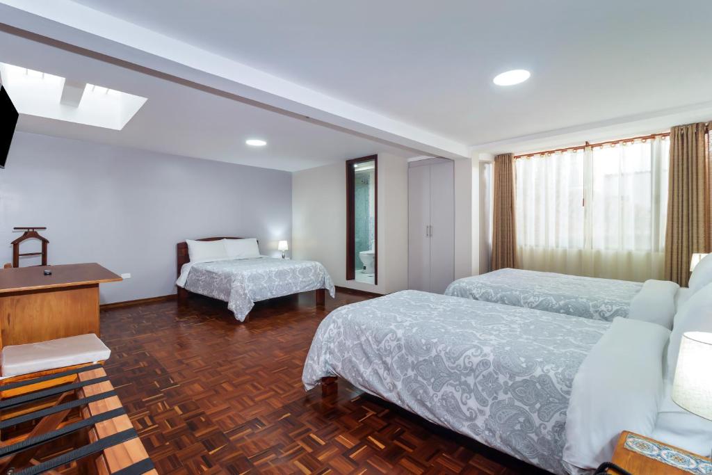 Postel nebo postele na pokoji v ubytování Hotel La Cartuja