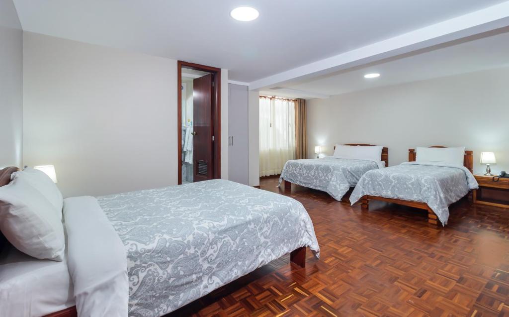 Postel nebo postele na pokoji v ubytování Hotel La Cartuja