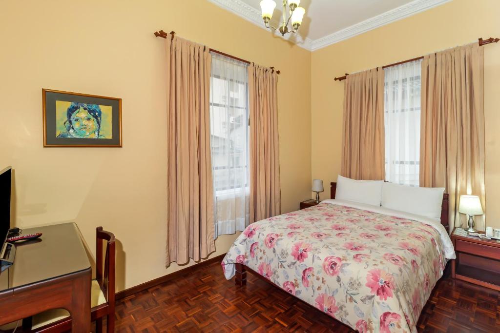Postel nebo postele na pokoji v ubytování Hotel La Cartuja
