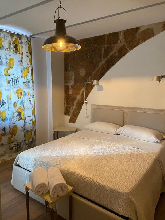 Postel nebo postele na pokoji v ubytování BB Orvieto