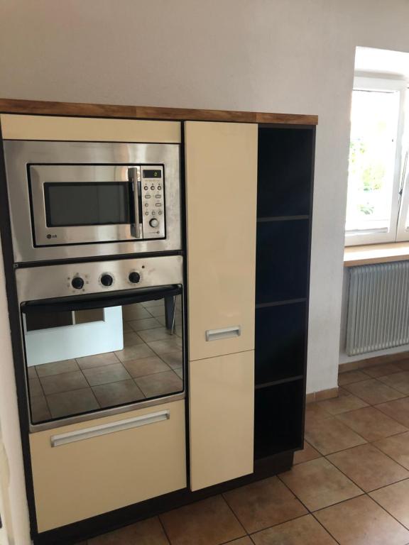 Kuchyň nebo kuchyňský kout v ubytování Ferienwohnung Eden
