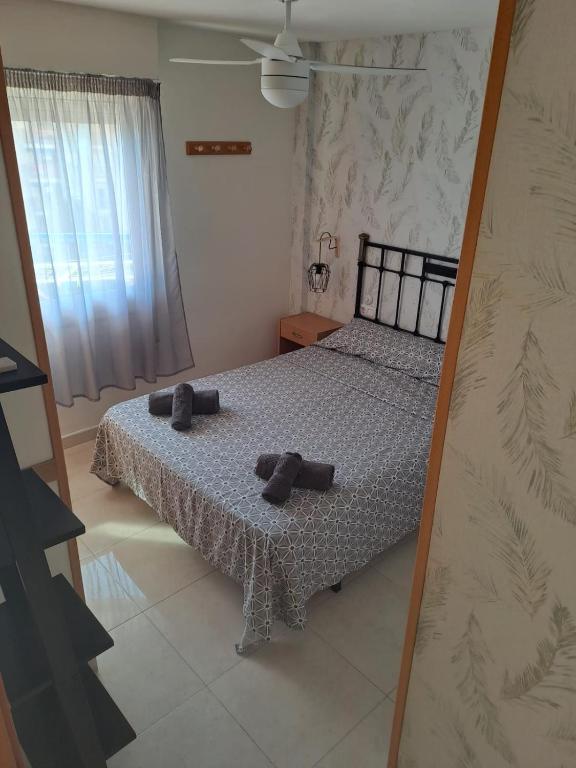 Postel nebo postele na pokoji v ubytování PALMAVERA BEACH