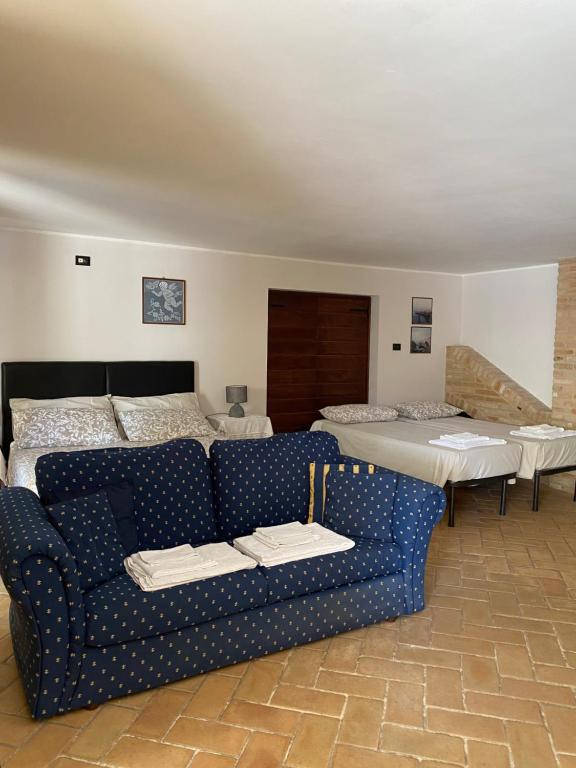 A bed or beds in a room at Rustico Althea - immerso nel verde