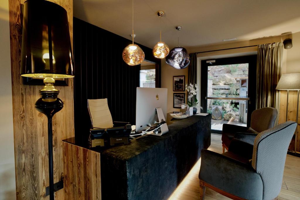 Kuchyň nebo kuchyňský kout v ubytování Hotel Montchalet
