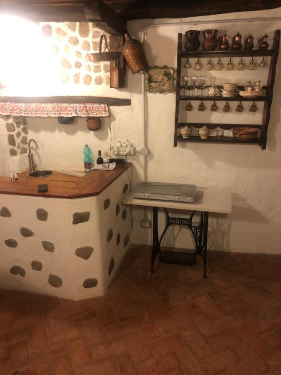 Kuchyň nebo kuchyňský kout v ubytování La casa della nonna