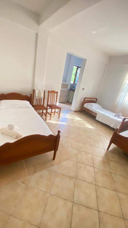 Postel nebo postele na pokoji v ubytování Besart room