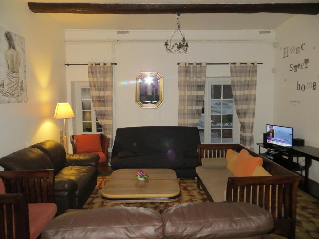 Posezení v ubytování Les Studios-Hôtel de Sommières