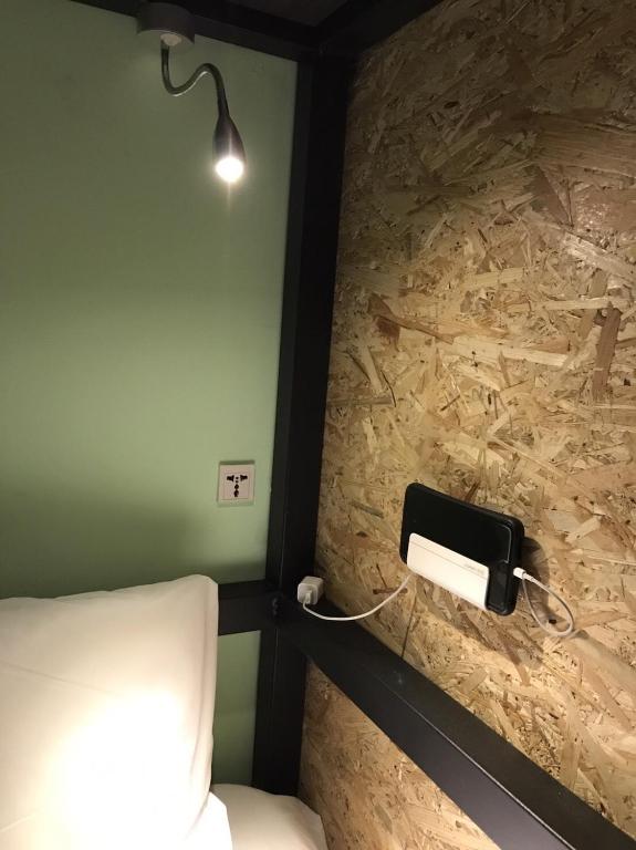 Postel nebo postele na pokoji v ubytování Tourist Bunny Hostel