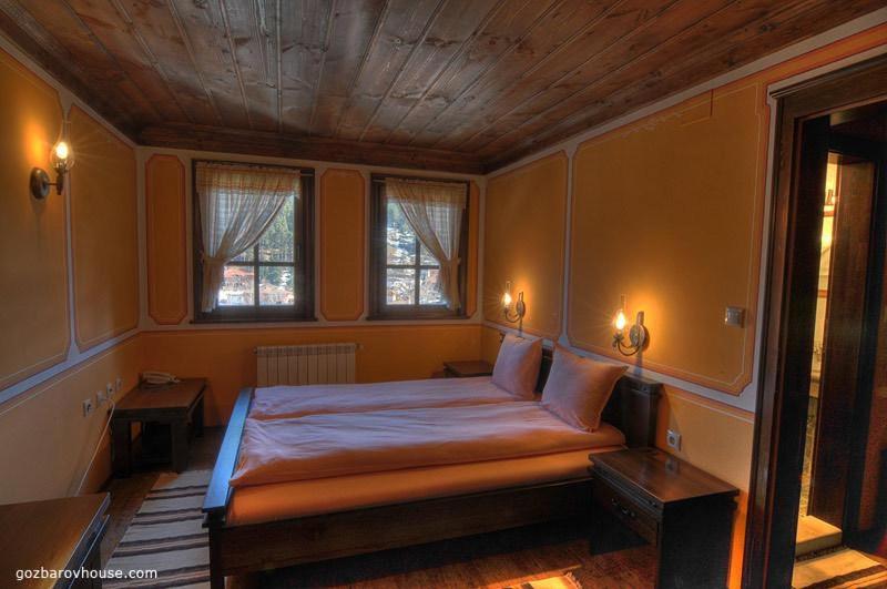 Postel nebo postele na pokoji v ubytování Gozbarov's Guest House