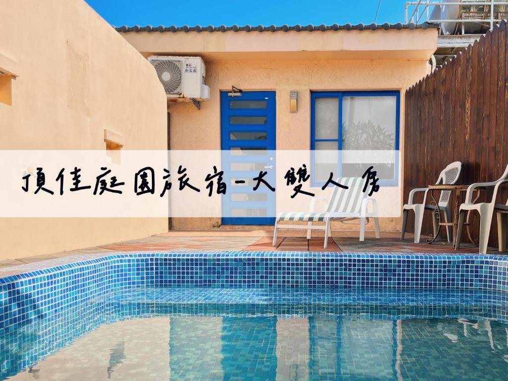 Bazén v ubytování Ding Jia Garden Resort nebo v jeho okolí