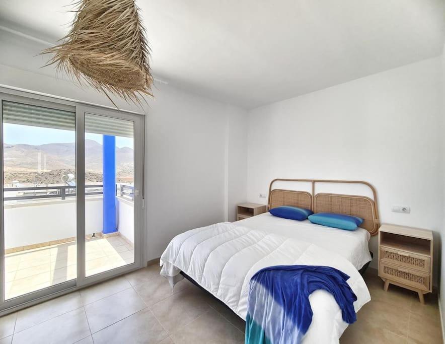 En eller flere senge i et værelse på Villa Galerna de Mar