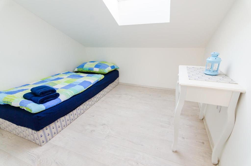 Postel nebo postele na pokoji v ubytování Guesthouse SaM