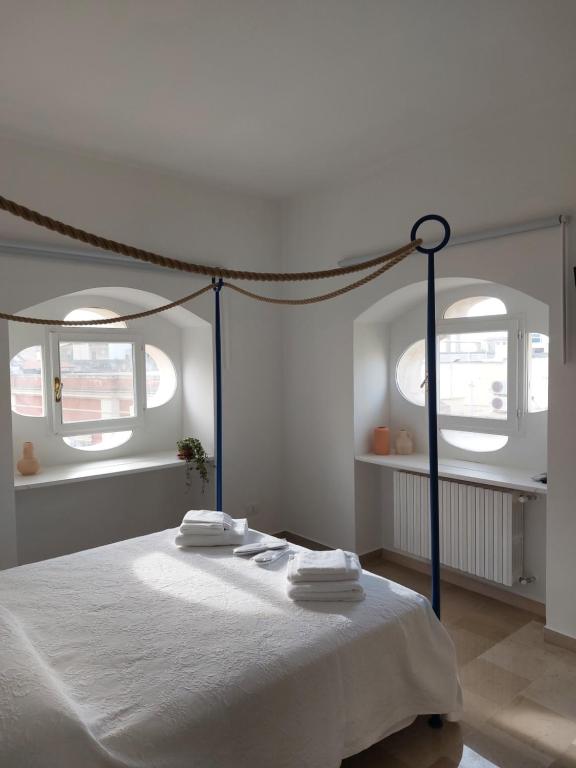 Postel nebo postele na pokoji v ubytování Palazzo Accinni B&B