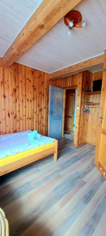 Postel nebo postele na pokoji v ubytování Dom Zajezdny