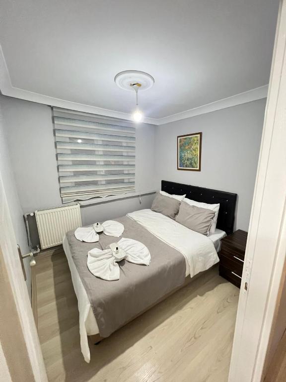 Postel nebo postele na pokoji v ubytování Taksim Millennium Suit Hotel
