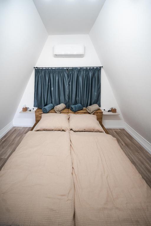 Postel nebo postele na pokoji v ubytování Volenter Lux Duna Spa