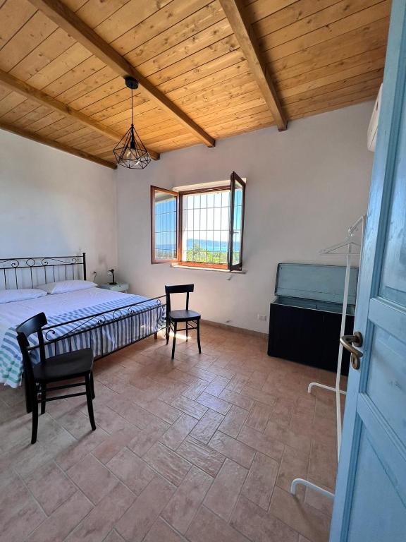 Postel nebo postele na pokoji v ubytování Casa laggiù