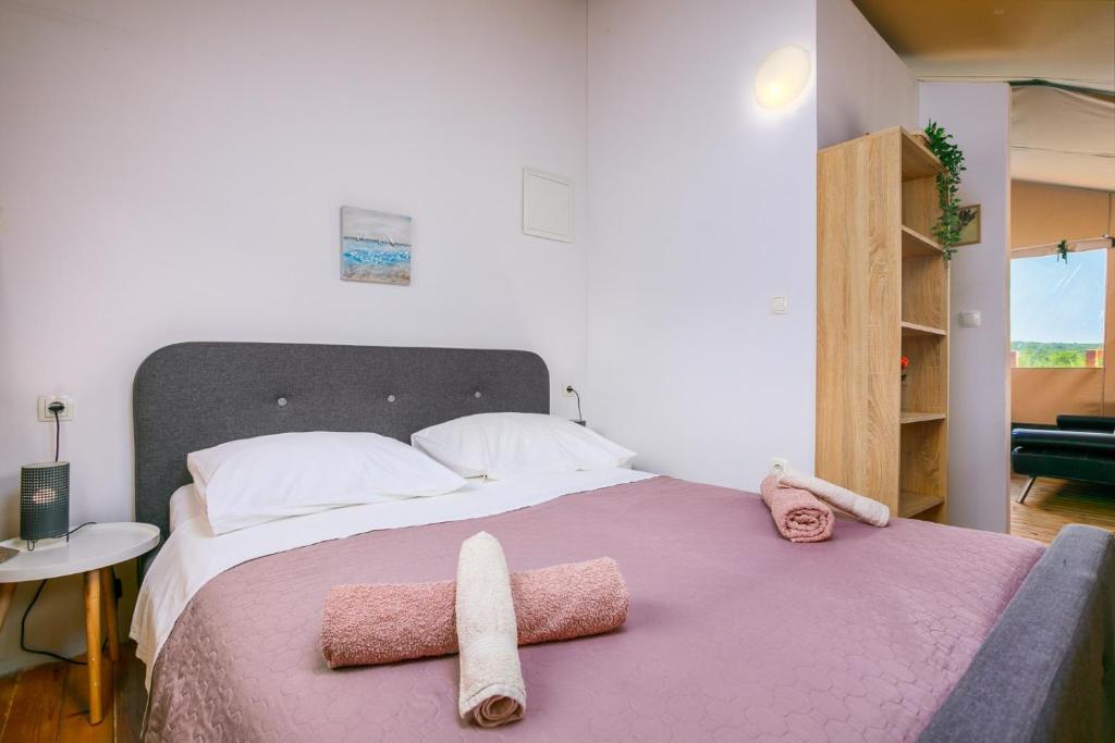 Postel nebo postele na pokoji v ubytování Prima insula glamping