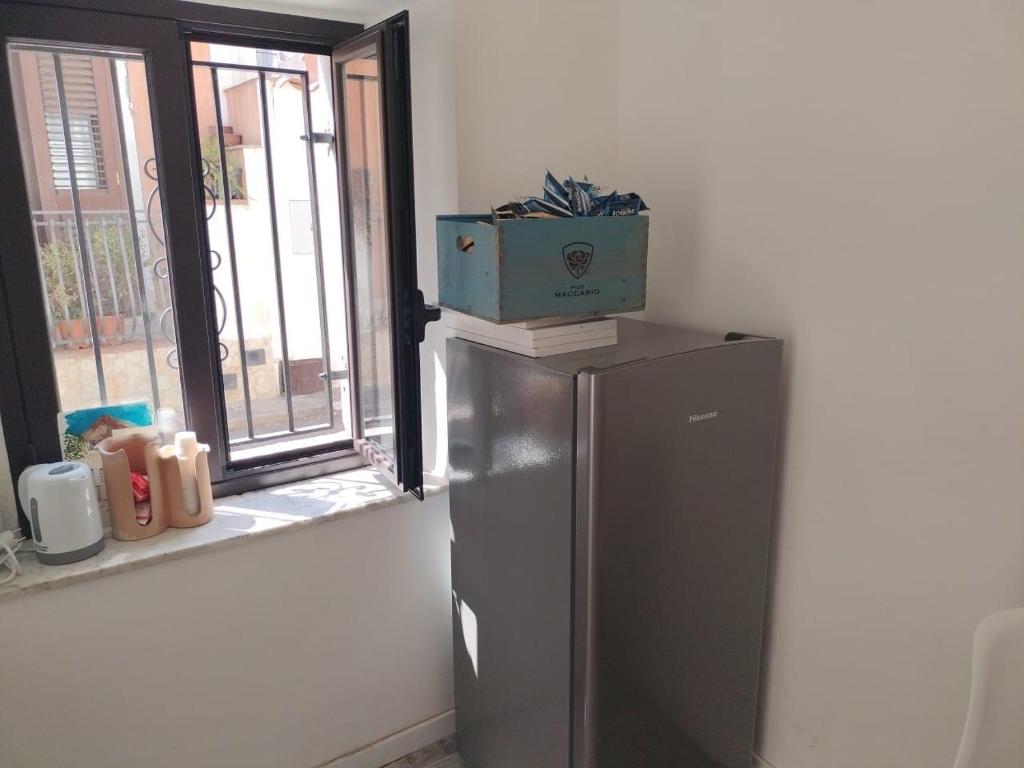 Kuchyň nebo kuchyňský kout v ubytování Il Regno delle due Sicilie - casa al mare con il terrazzo