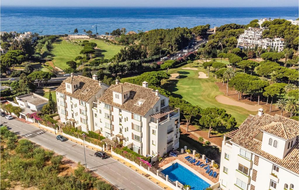 an aerial view of a building and the ocean at 2 Bedroom Gorgeous Apartment In Marbella in Marbella