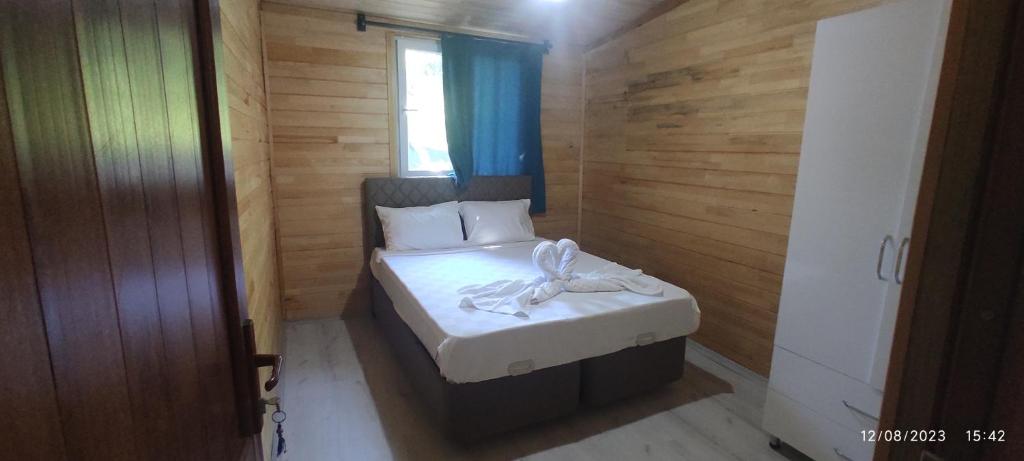 Postel nebo postele na pokoji v ubytování Teo Hotel&Pansion