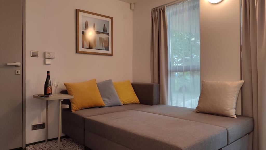 Postel nebo postele na pokoji v ubytování Apartmán Bříza, výhled na zámek