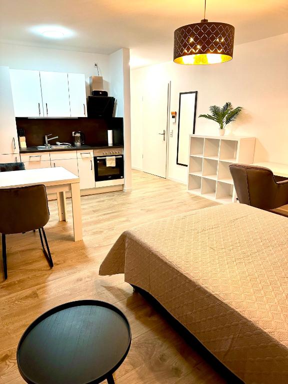 Kuchyň nebo kuchyňský kout v ubytování Moderne 1-Zi Stadtwohnung