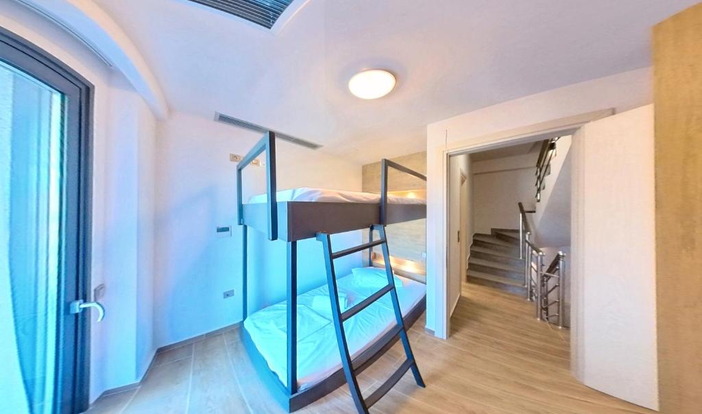 Posteľ alebo postele v izbe v ubytovaní Mulberry Nikiti Resorts