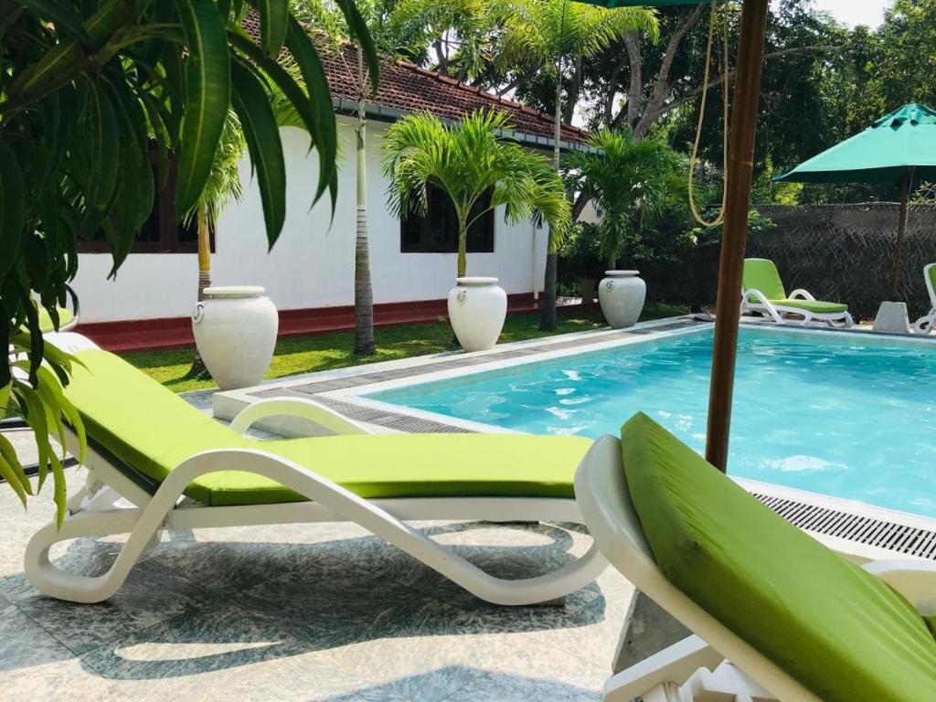 Bazén v ubytování Emerald Villas Weligama nebo v jeho okolí