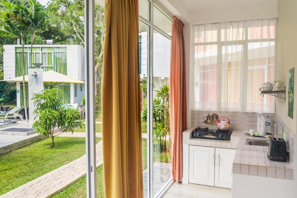 Zahrada ubytování Emerald Villas Weligama