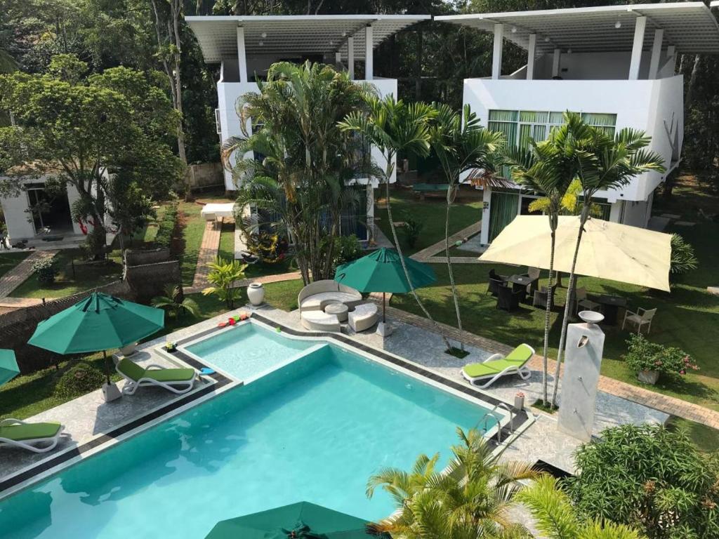 Bazén v ubytování Emerald Villas Weligama nebo v jeho okolí