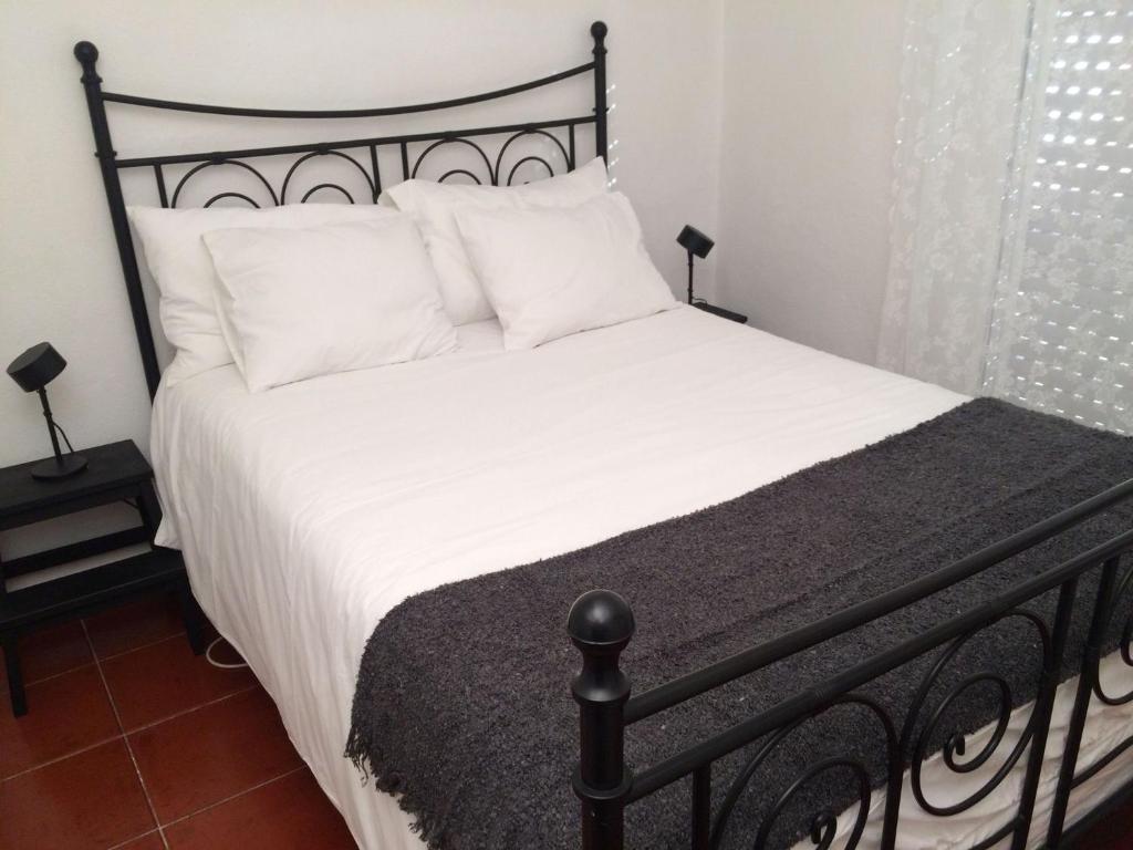 Postel nebo postele na pokoji v ubytování Caparica Holidays