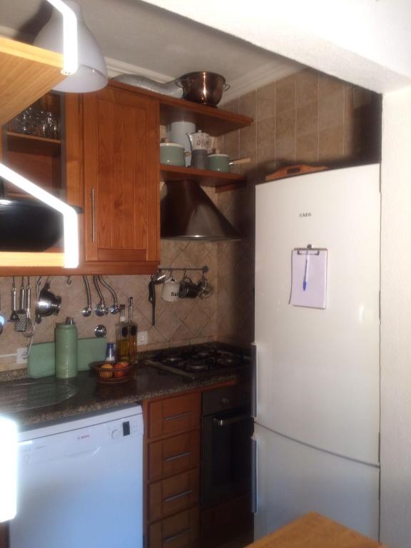 Kuchyň nebo kuchyňský kout v ubytování Caparica Holidays