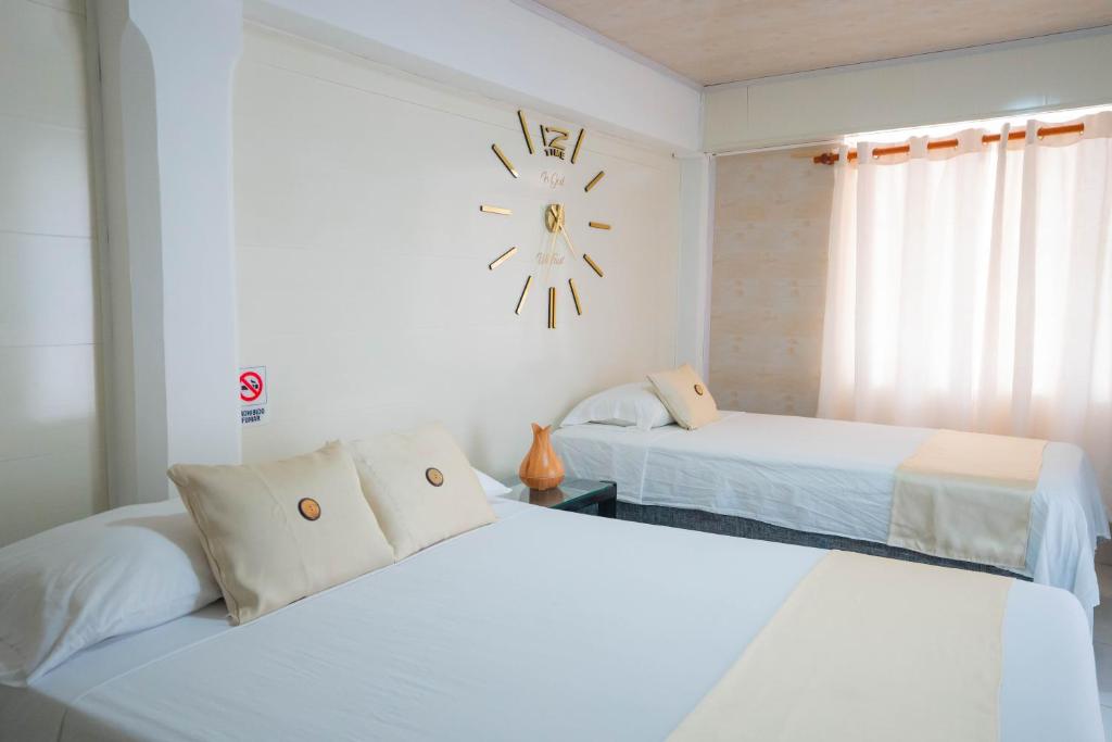 Postel nebo postele na pokoji v ubytování Posada Jasmina Place