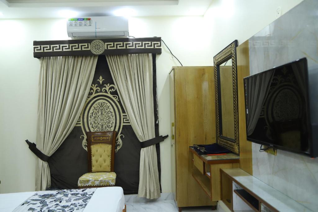 Booking.com: Roomi Rezidor Guest House , Karachi, Pakistan . Rezervirajte  svoj smještaj već sada!