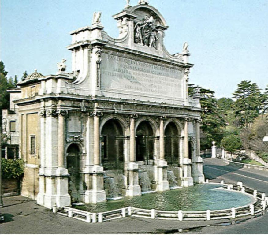 ローマにあるB&D Dolce Vitaの通りの中間に噴水のある建物