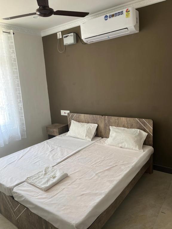 Postel nebo postele na pokoji v ubytování SAN BEACH RESIDENCY