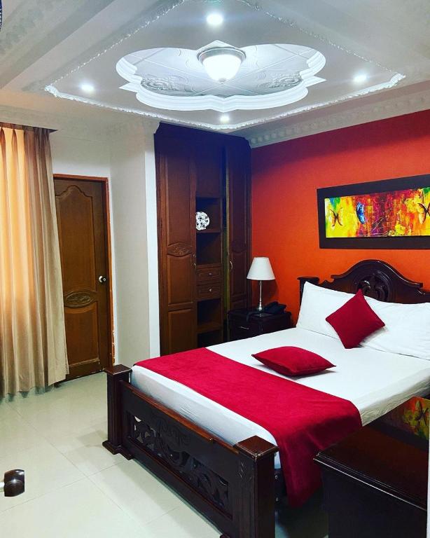 Postel nebo postele na pokoji v ubytování Hotel Vans Valledupar