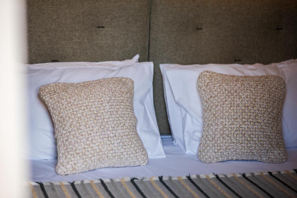 Postel nebo postele na pokoji v ubytování Palaia Luxury Suite
